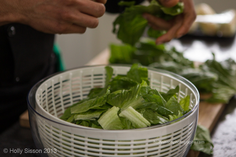 Chef Preparing Lettuce for Salad