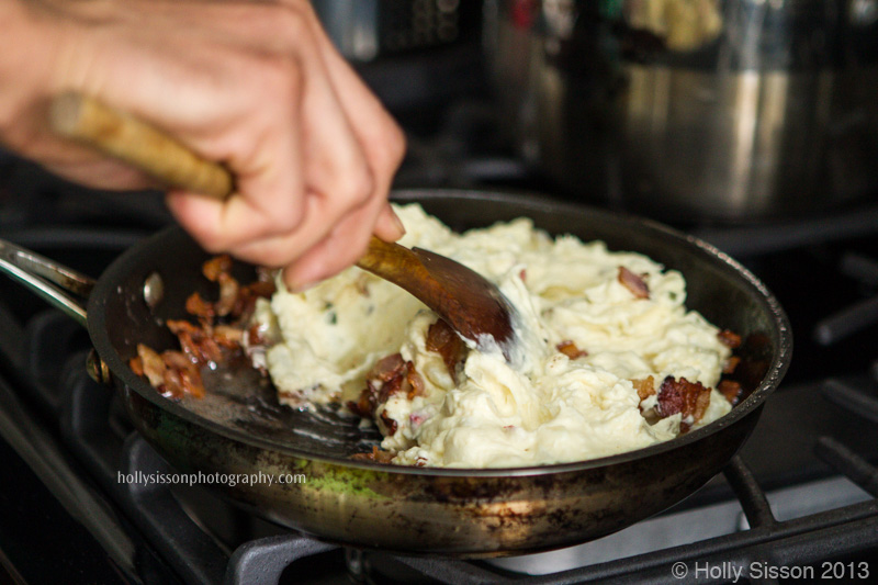 Chef Cooking up warm potato salad