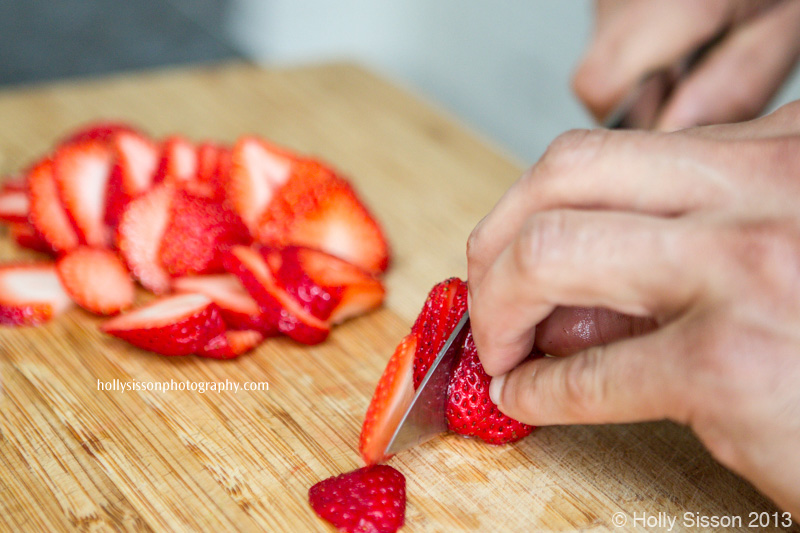 Chef Slicing Strawberries for Salad